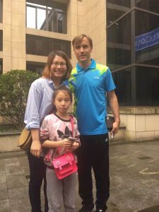 Dario Simic, the Croatian soccer star who won World Cup Bronze in 1998, posed with Grade 3 student Joyce Zhang.
