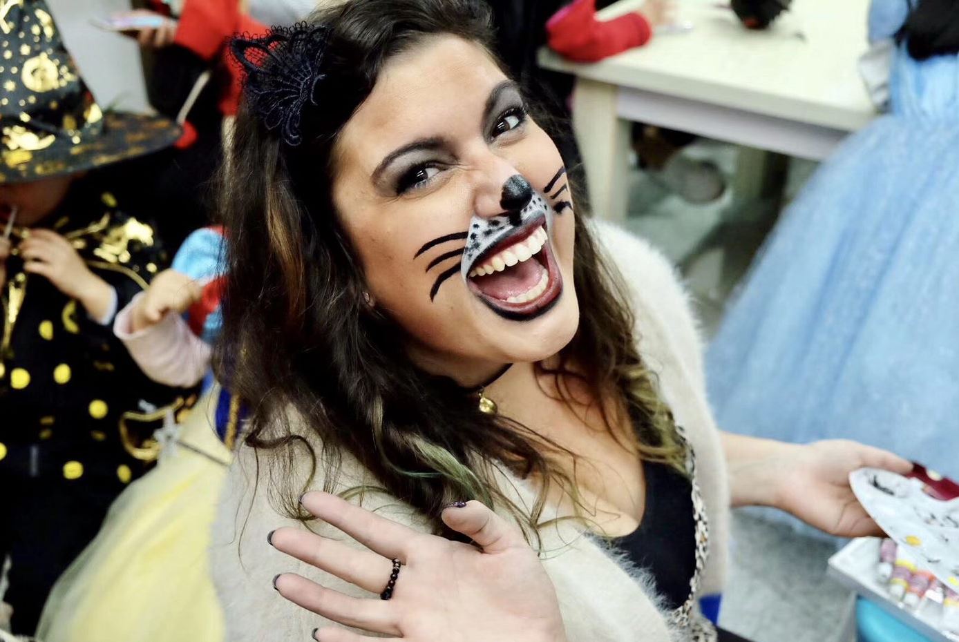 Ms. Annie Wall with her face painted like a cat