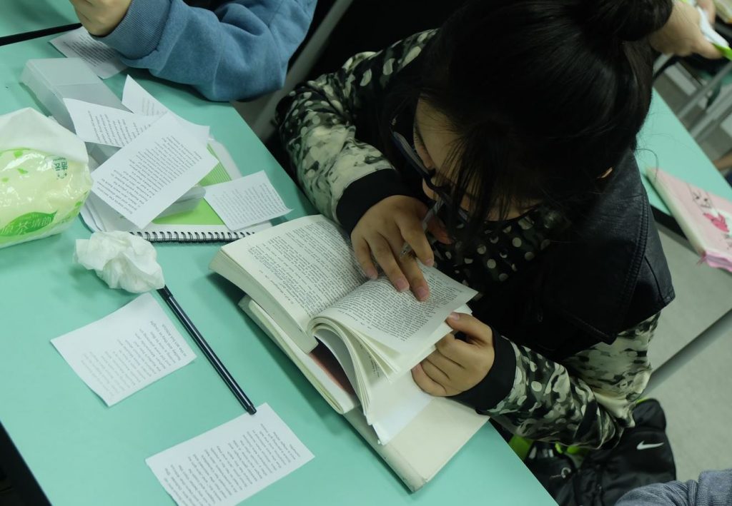 Ms. Wall’s student reading To Kill a Mockingbird