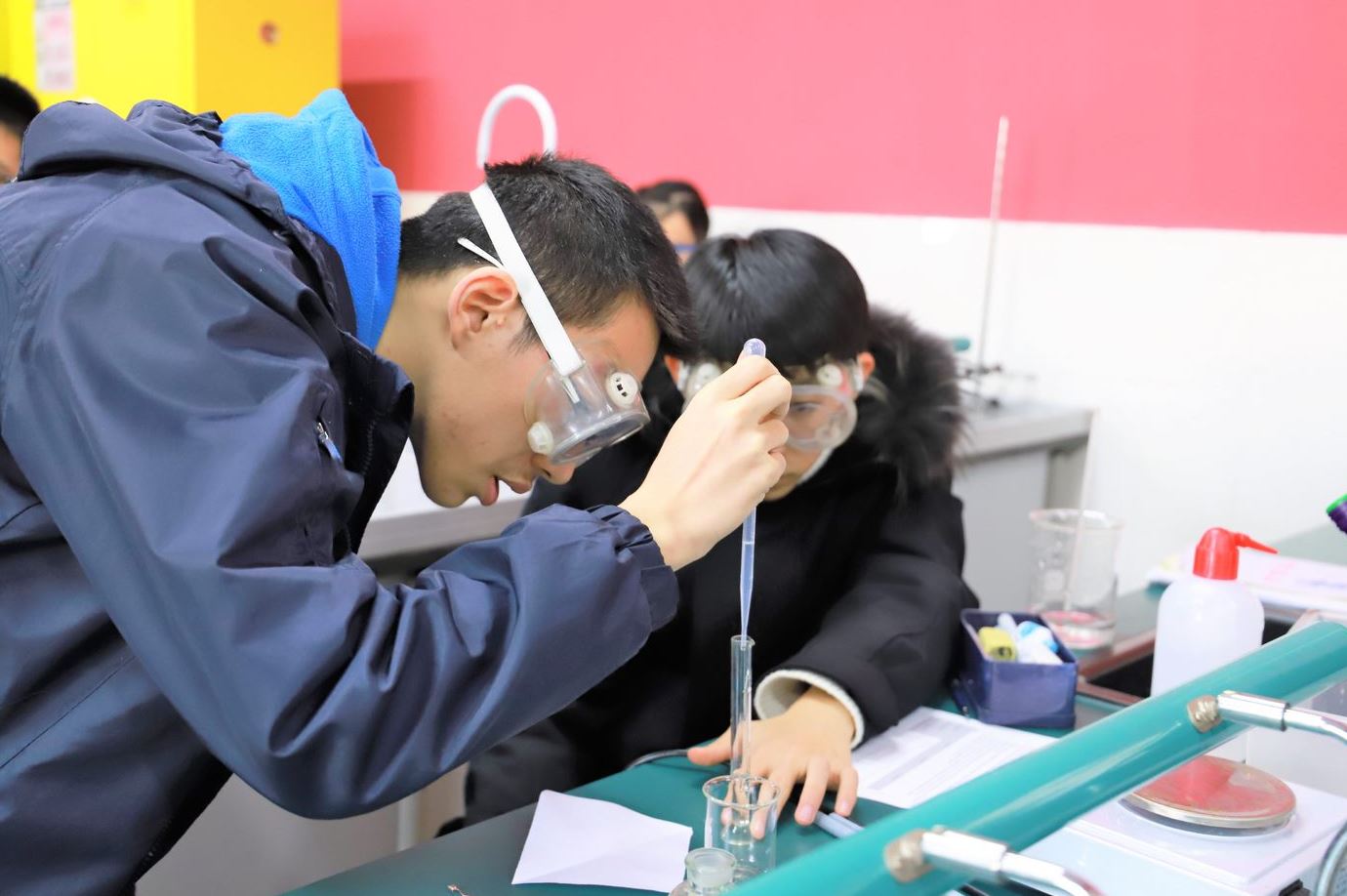 Chinese students Test Chemical Reactions in Chemistry Class