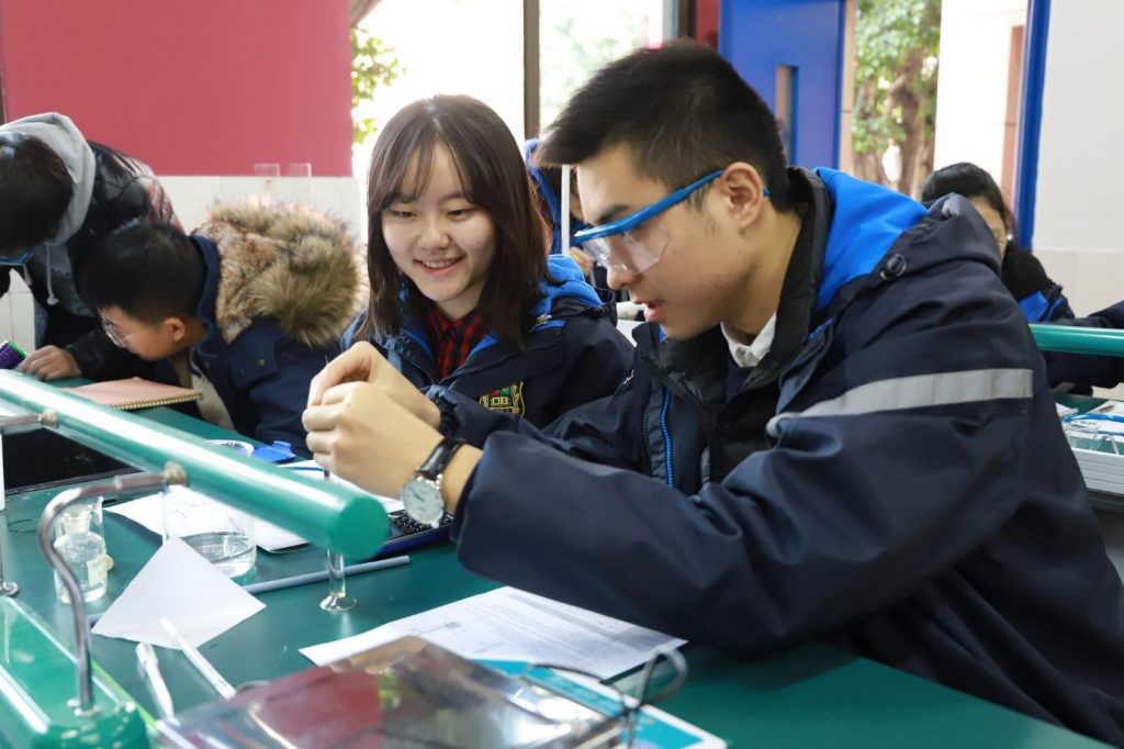 Chinese students Test Chemical Reactions in Chemistry Class