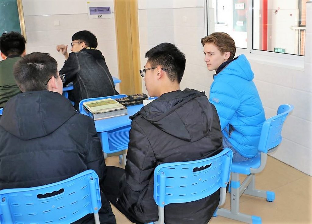 Exchange student Sam Guyer with Chinese classmates in Haimen