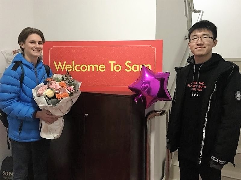 Exchange student Sam Guyer welcomed by his host family brother Mark